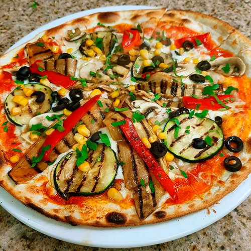 platos pizza vegetal pizzería en torredembarra 